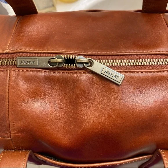 Always limited edition brown leather duffle bag unisex